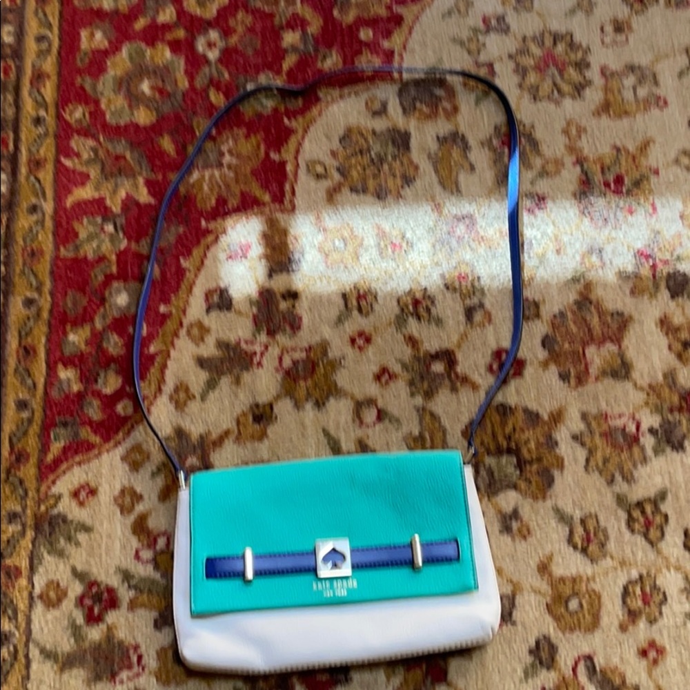 Kate Spade tricolor purse with shoulder strap.